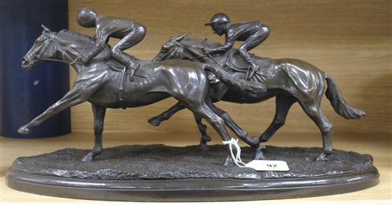 A resin group of two racehorses